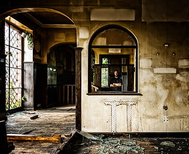 man standing inside room thumbnail