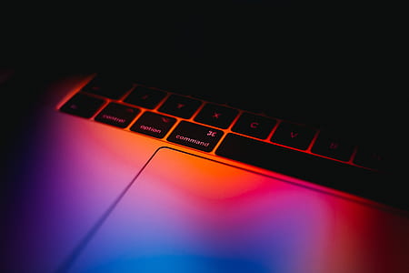 flat lay photography of MacBook Pro under neon lights thumbnail
