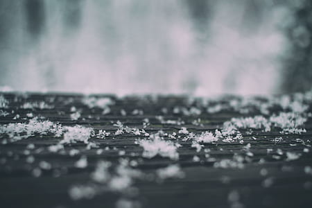 snowflakes on brown surface thumbnail