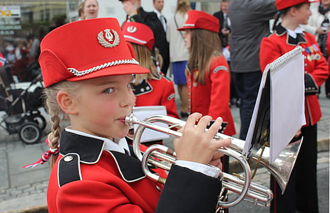 girl playing instrument on outdoors thumbnail