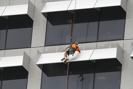 man hanging on rope thumbnail