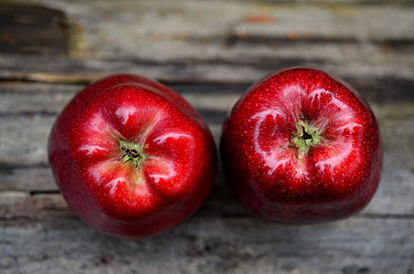 two red unripe apples thumbnail