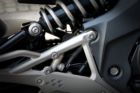 closeup photo of motorcycle coilover thumbnail