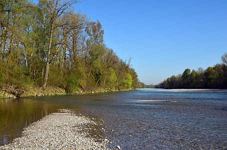 landscape photography of river surrounded with trees thumbnail