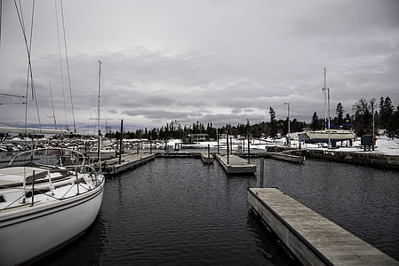 Docks, ships, and landscape in the winter in Grand Marais, Minnesota thumbnail