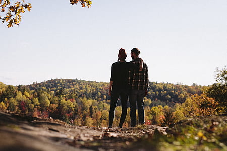 man and woman in forest during daytime thumbnail