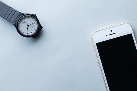 gold iPhone 5s and analog watch thumbnail