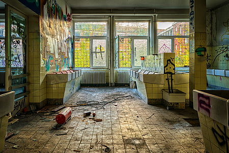 abandoned building with graffiti at daytime thumbnail