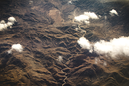 bird's eye photo of mountain and clouds thumbnail