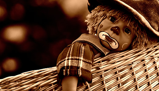 clown kid on brown wicker basket thumbnail