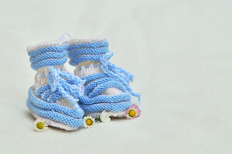 pair of blue and white knit shoes thumbnail