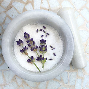 purple flower on white mortar and pestle thumbnail