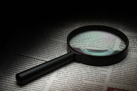 round magnifying glass with black frame thumbnail