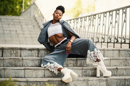 Photo of Woman Wearing Blue Blazer and Blue Pants on Stairs thumbnail