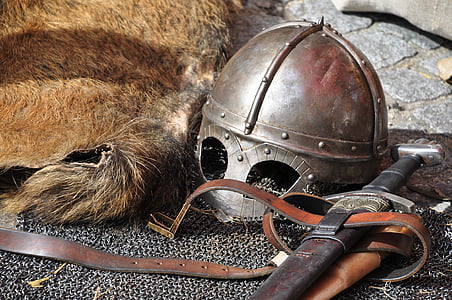 closeup photo of sword and helmet thumbnail