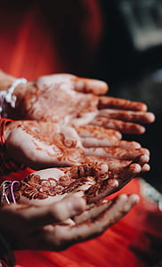 bridal mehndi in shallow focus photography thumbnail