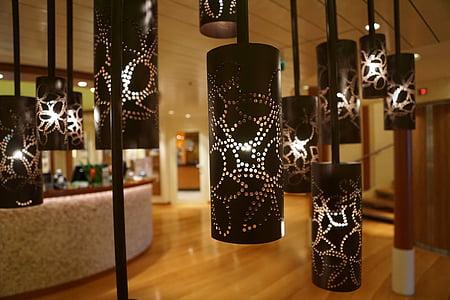 lighted black pendant lamps inside building thumbnail