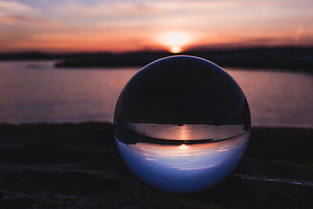 Close-Up Photography of Crystal Ball During Dawn thumbnail