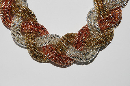 silver-colored and gold-colored accessory thumbnail