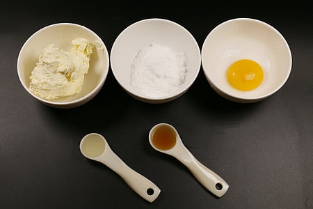 three white ceramic bowls with rice and eggs thumbnail