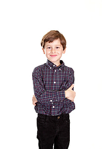 boy wearing black, white, and red flannel shirt thumbnail
