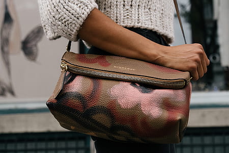 person wearing brown leather crossbody bag thumbnail