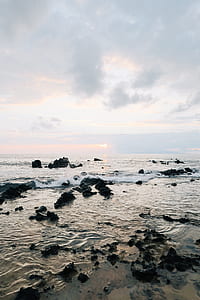 Body of Water at Cloudy Sky thumbnail