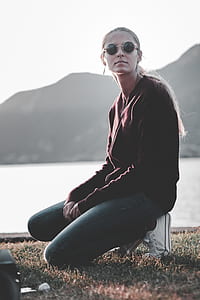 woman kneel on grass thumbnail