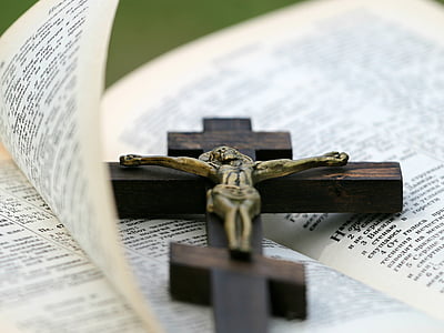 crucifix on bible page thumbnail