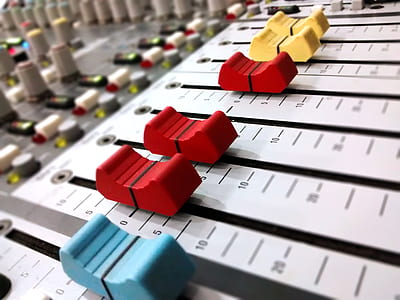 selective focus photography of white, blue, and red control panel thumbnail