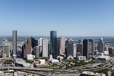 photo of brown and gray high rise buildings during daytime thumbnail