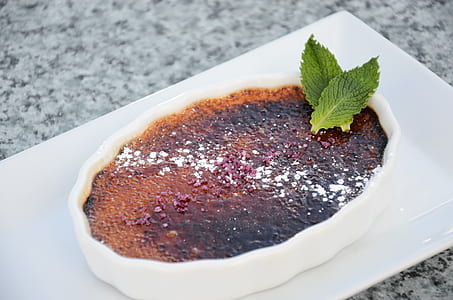 torched sugar dish with two green leaves on ceramic bowl thumbnail