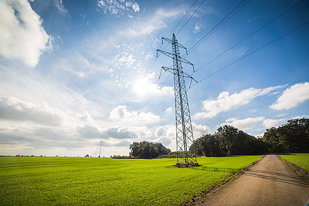 Road Under Power Line Electricity Pylons thumbnail