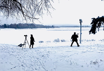 two person standing on snow thumbnail
