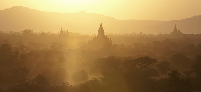silhouette of concrete structures during sunrise thumbnail