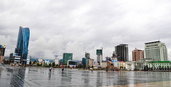 concrete building under white clouds at daytime thumbnail
