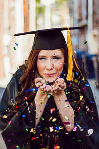 woman blowing confetti thumbnail