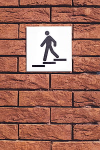stairs signage mounted on concrete brick wall thumbnail