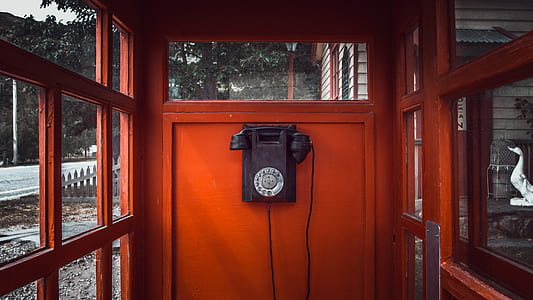 photo of black and red telephone booth thumbnail