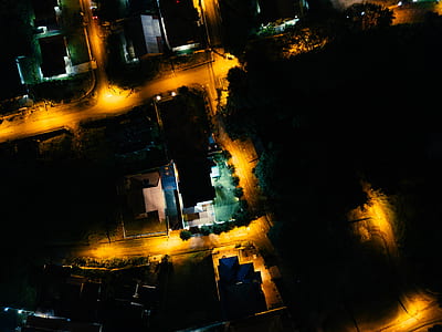 aerial photo of buildings at nighttime thumbnail