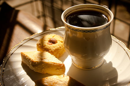 three breads beside poured cup on plate thumbnail