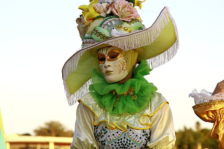 person wearing masquerade mask thumbnail