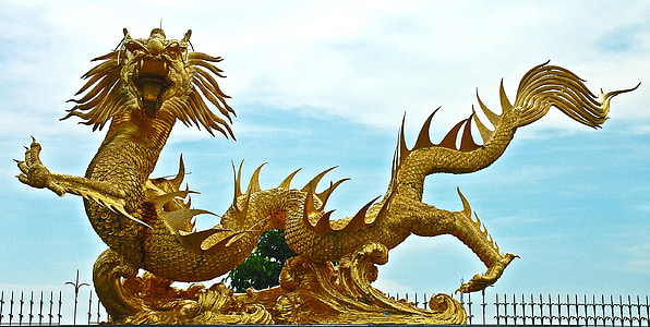 shallow focus of gold dragon statue thumbnail