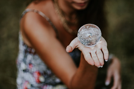 Woman with a little crystal ball thumbnail