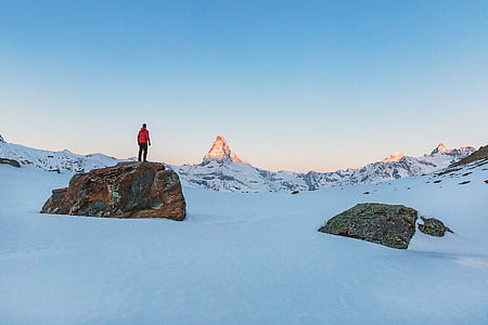 person standing on boulder thumbnail