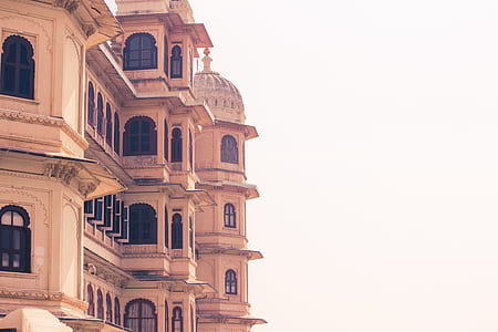architectural photography of brown building thumbnail