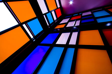 multicolored colorblock walls in low angle photography thumbnail
