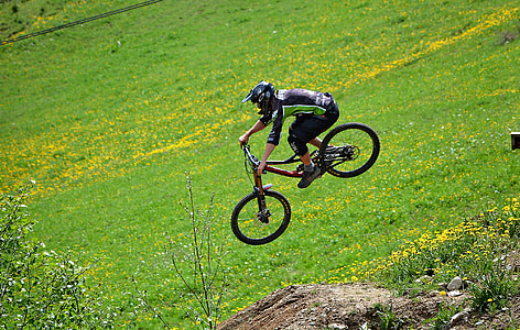 black performing BMX exhibition during daytime thumbnail