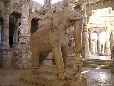 brown concrete elephant statue inside the temple thumbnail