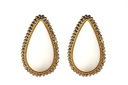 pair of gold-colored earrings thumbnail